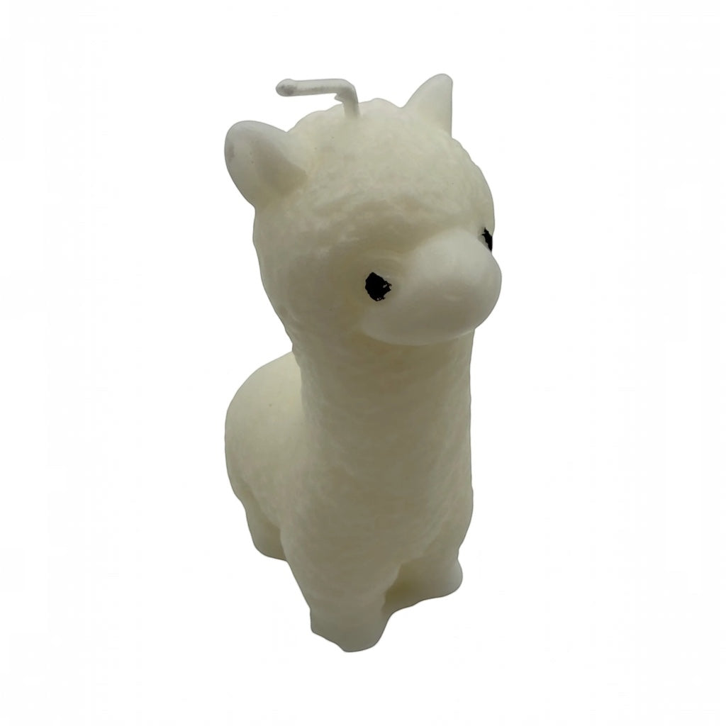 Pepper & White Alpine Alpaca shaped white wax candle with cute facial features and a single wick