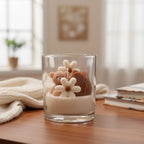 Pepper & White Bear Hugs candle in a glass jar featuring decorative wax teddy bear and flower shapes, 390g size.