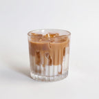 Pepper & White Matcha Latte candle in a ribbed glass tumbler resembling an iced coffee with layered wax design.
