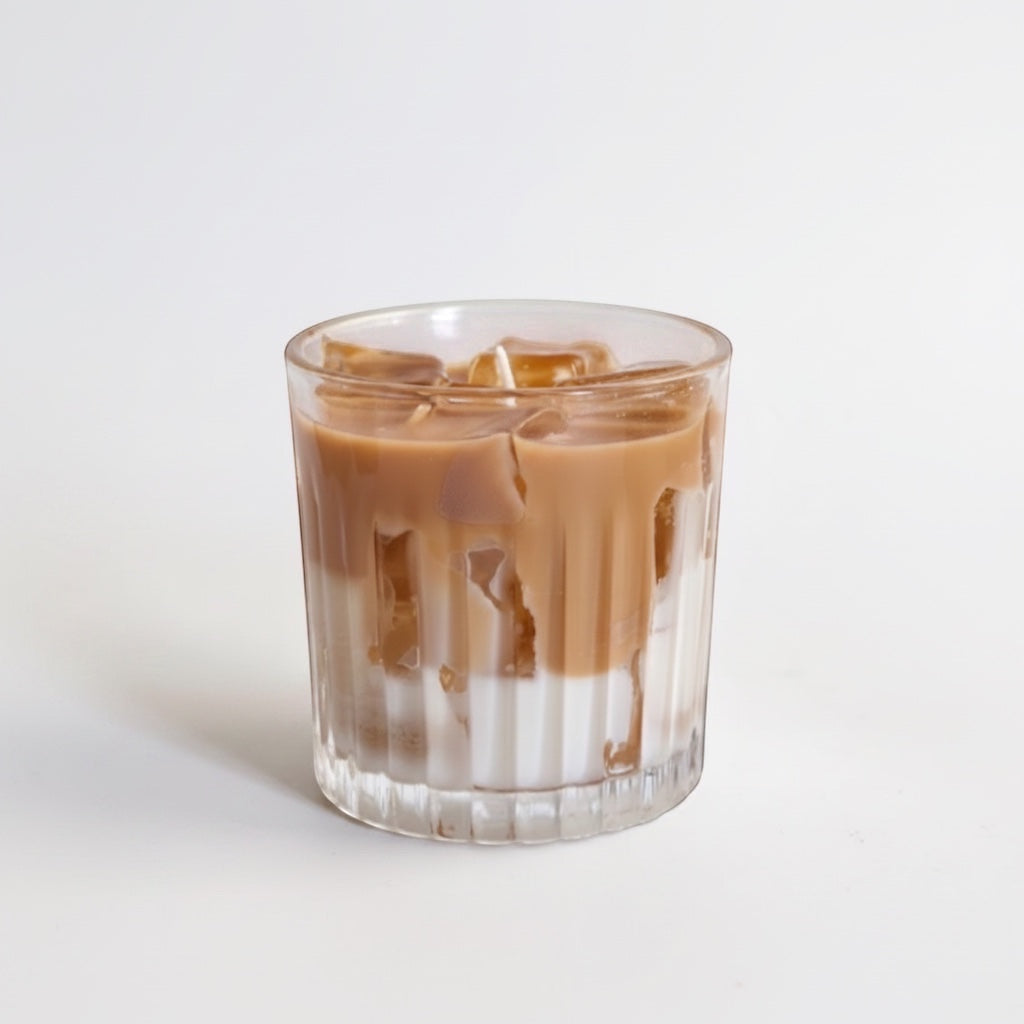 Pepper & White Matcha Latte candle in a ribbed glass tumbler resembling an iced coffee with layered wax design.