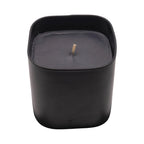 Pepper & White Noir Champagne 280g scented candle in a sleek matte black square glass jar